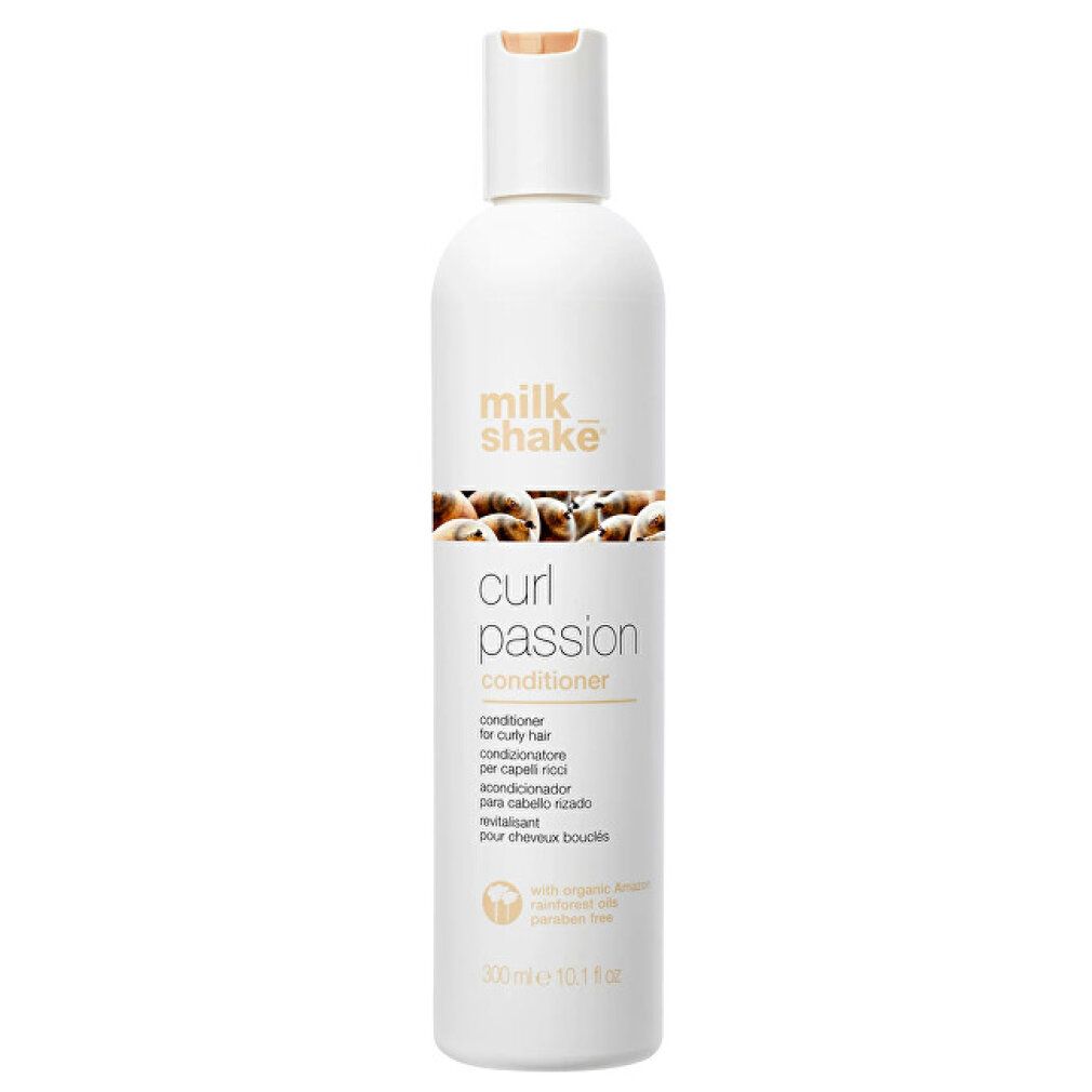 Flasche mit Conditioner. Aufschrift: Milk_shake, Curl Passion Conditioner. Für lockiges Haar. 300ml.