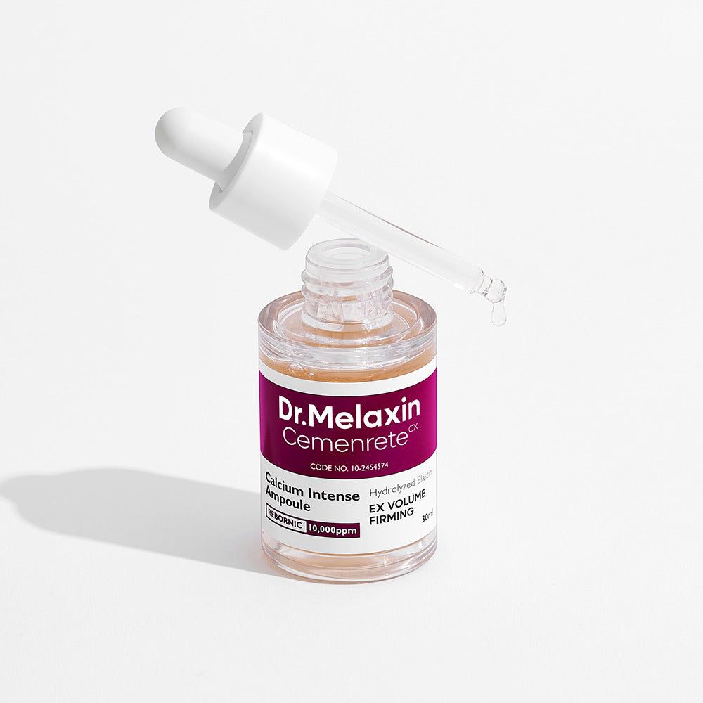 Dr. Melaxin Cemenrete Ampulle mit Pipette, aus der Flüssigkeit tropft.