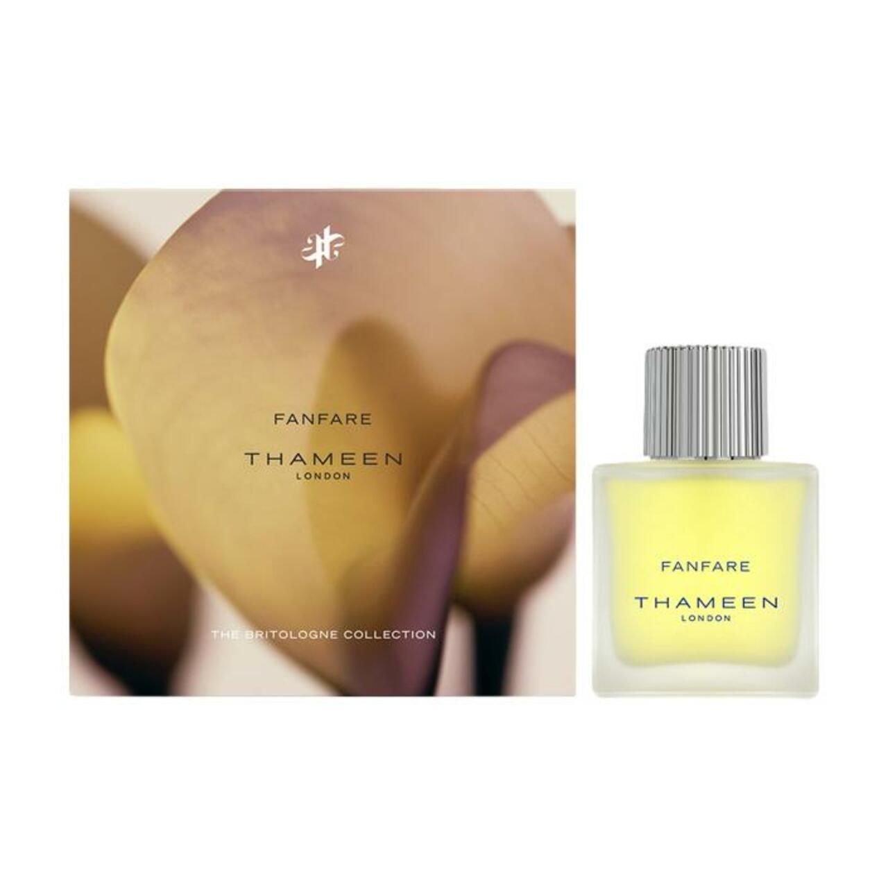 Flakon neben Verpackung. Aufschrift: FANFARE, THAMEEN LONDON, THE BRITCOLOGNE COLLECTION. Gelbe Flüssigkeit sichtbar.