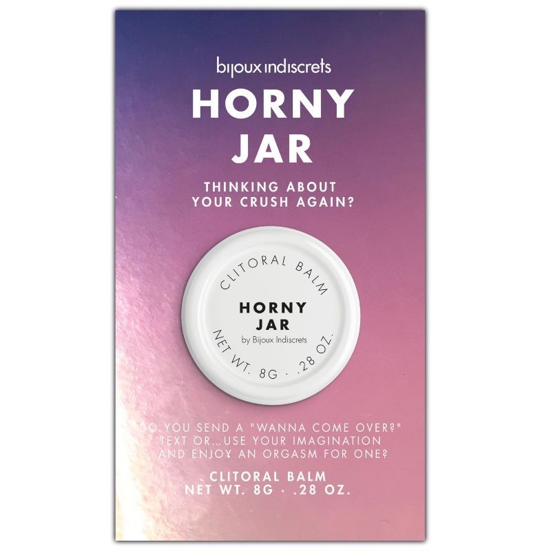 Verpackung mit Produkt. Aufschrift: "Horny Jar", "Clitoral Balm", 8g. Marke: Bijoux Indiscrets. Hintergrund: Farbverlauf.