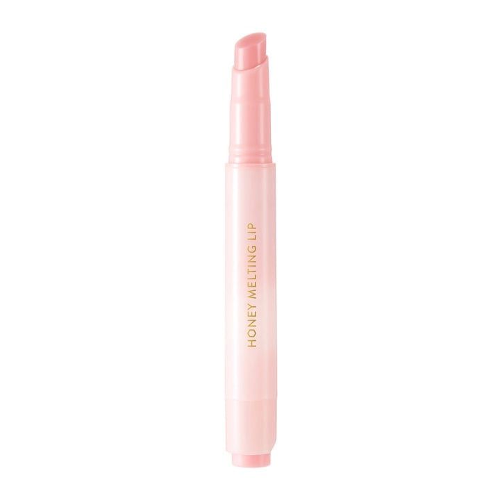 Hellrosa Lippenstiftstift mit Aufschrift "HONEY MELTING LIP".