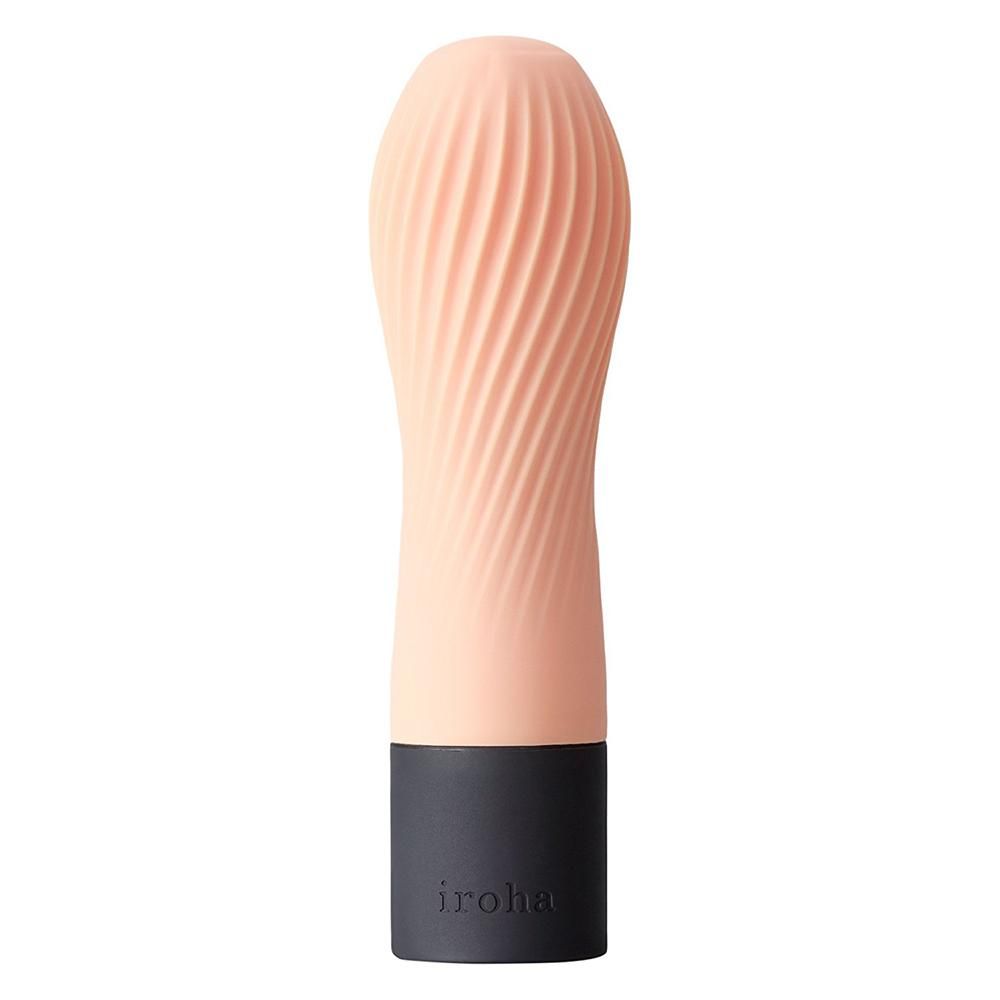 Zylindrischer Vibrator in Pfirsichfarbe mit schwarzem Sockel. Die Oberfläche ist geriffelt. Auf dem Sockel steht "iroha".