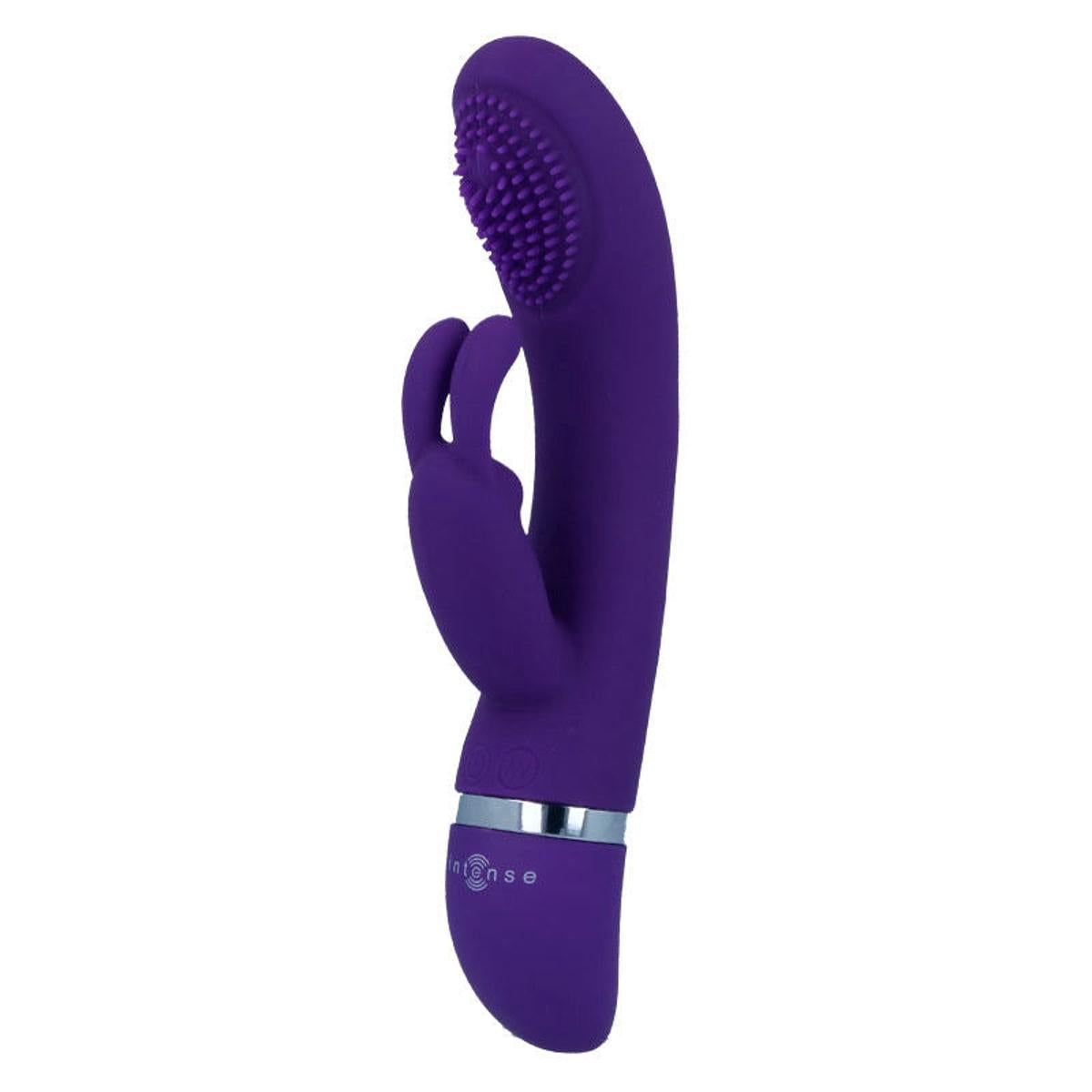 Lila Vibrator mit Kaninchenohren-Design. Geriffelte Spitze, silberner Ring am Griff.