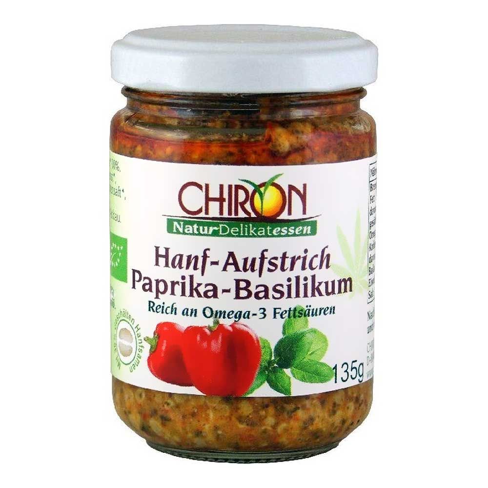 Glas mit Aufstrich. Aufschrift: CHIRON, Hanf-Aufstrich Paprika-Basilikum. Abbildung von Paprika und Basilikum. 135g.