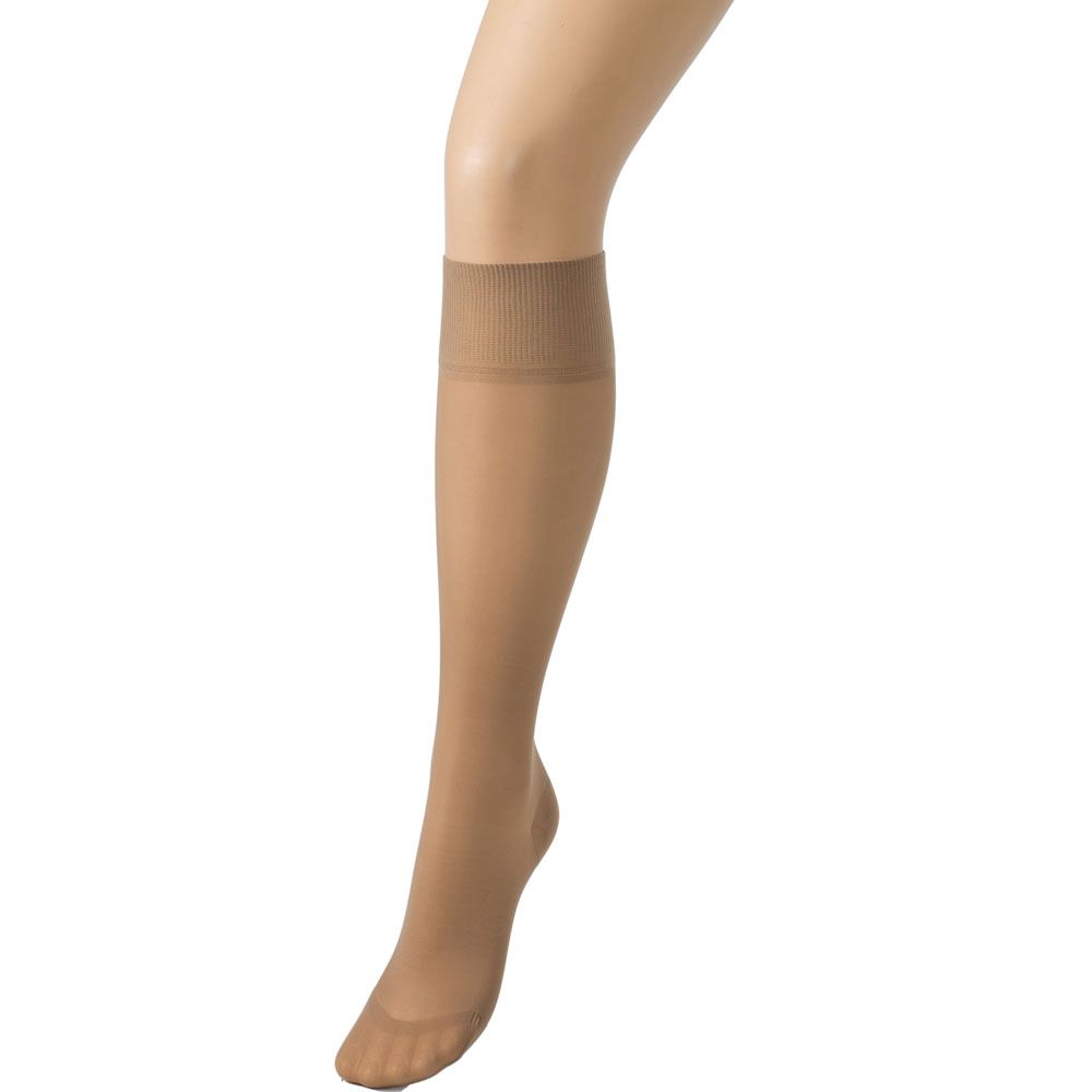 Hautfarbene Kompressionsstrümpfe bis zum Knie. Feines, transparentes Material. Gerippter Bund.