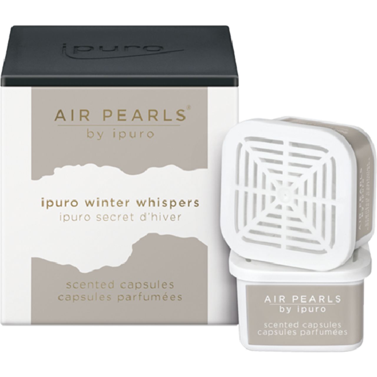 Verpackung mit "Air Pearls" und zwei Kapseln. Aufschrift: "ipuro winter whispers". Weiße Kapseln mit Lochmuster.