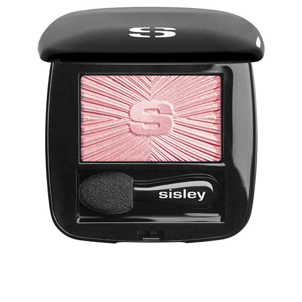 Geschlossene schwarze Lidschatten-Kompaktpuder mit Sisley-Logo. Rosa Lidschatten mit Sisley-Logo und Applikator.