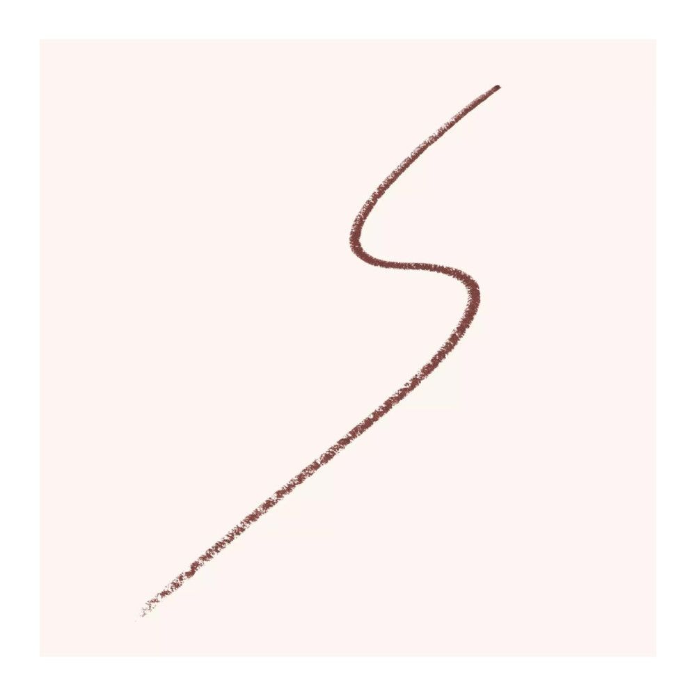 Brauner Kajalstrich auf hellem Hintergrund. Form einer geschwungenen Linie.