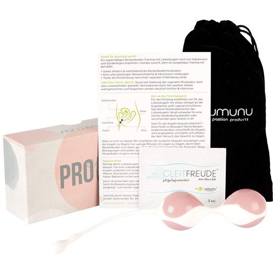 Produkt mit zwei rosafarbenen Kugeln, Zubehör, Verpackung mit "PRO"-Schriftzug und Text.