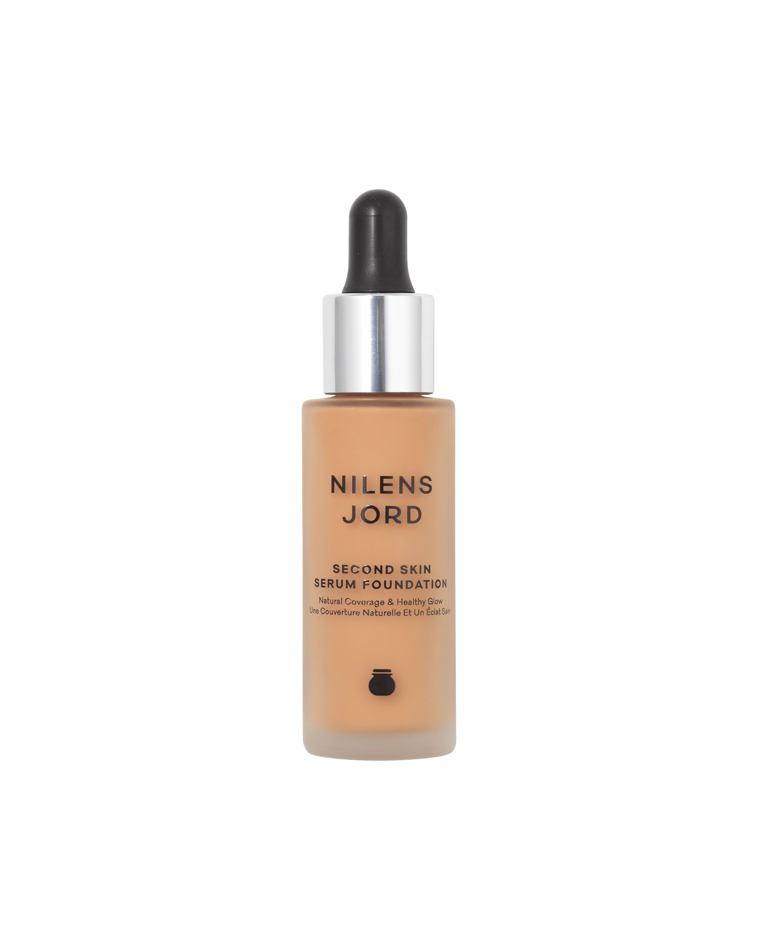 Nilens Jord Second Skin Serum Foundation in hellem Braunton mit Pipette.