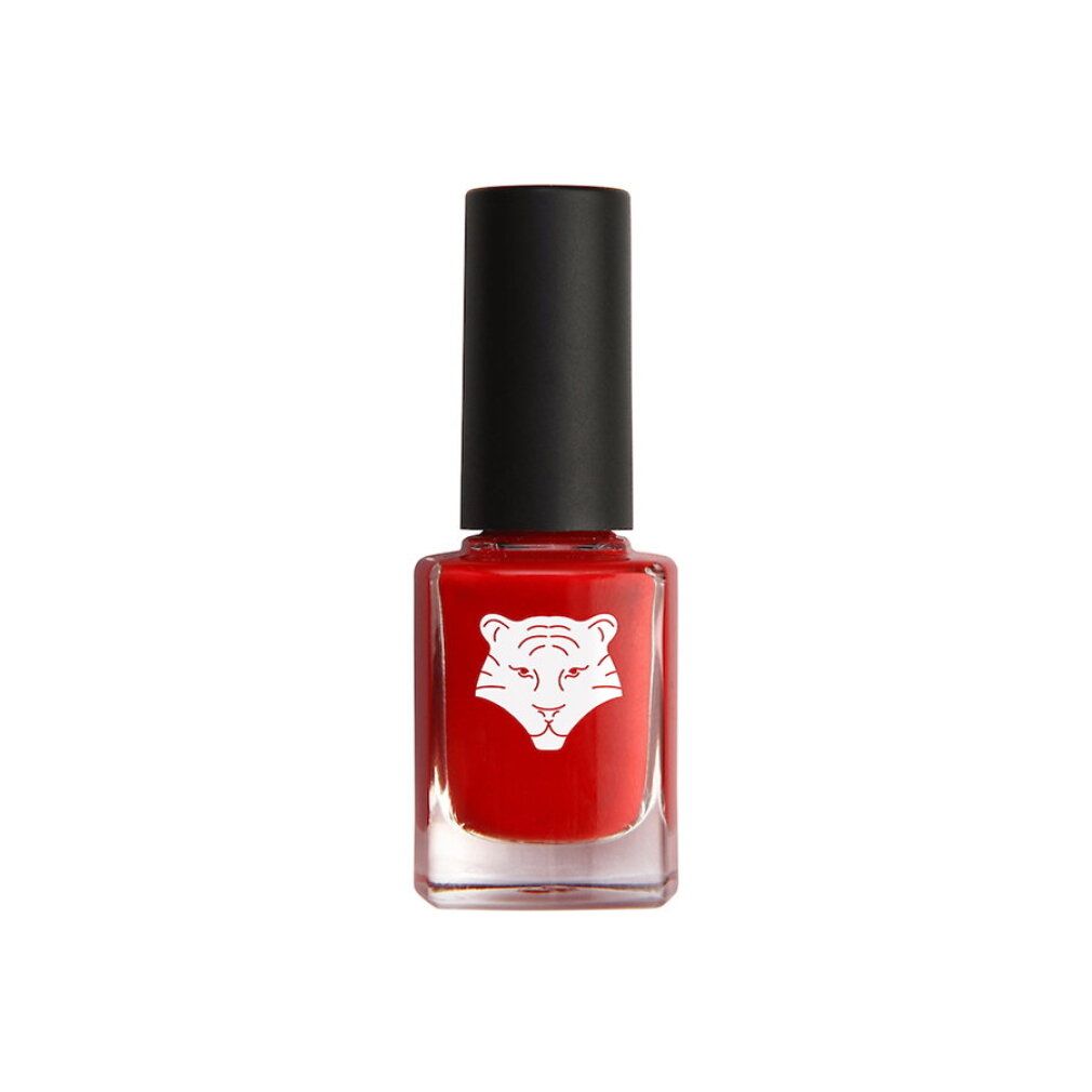 Roter Nagellack in Glasflasche mit schwarzem Deckel und weißem Tigerkopf-Logo.