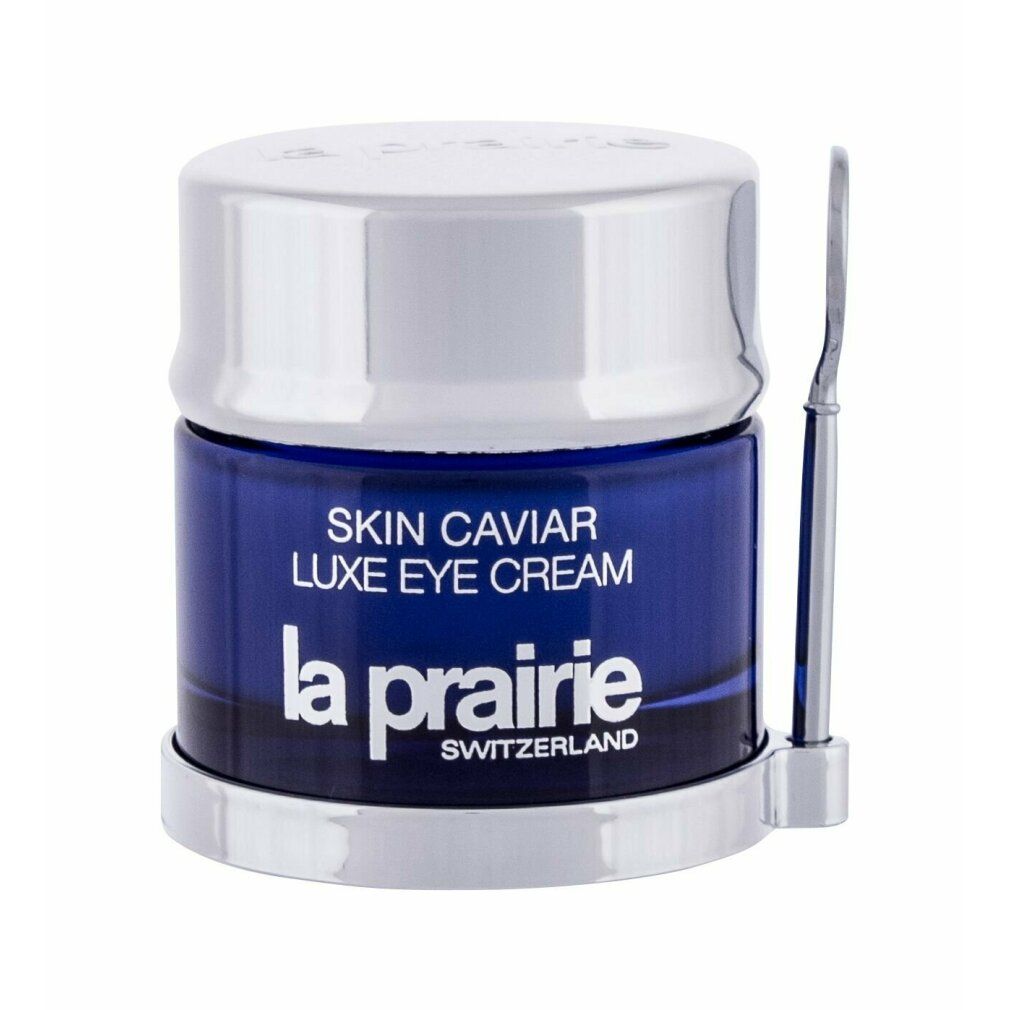 Blaues Glas mit silbernem Deckel und Spatel. Aufschrift: Skin Caviar Luxe Eye Cream, La Prairie, Switzerland.