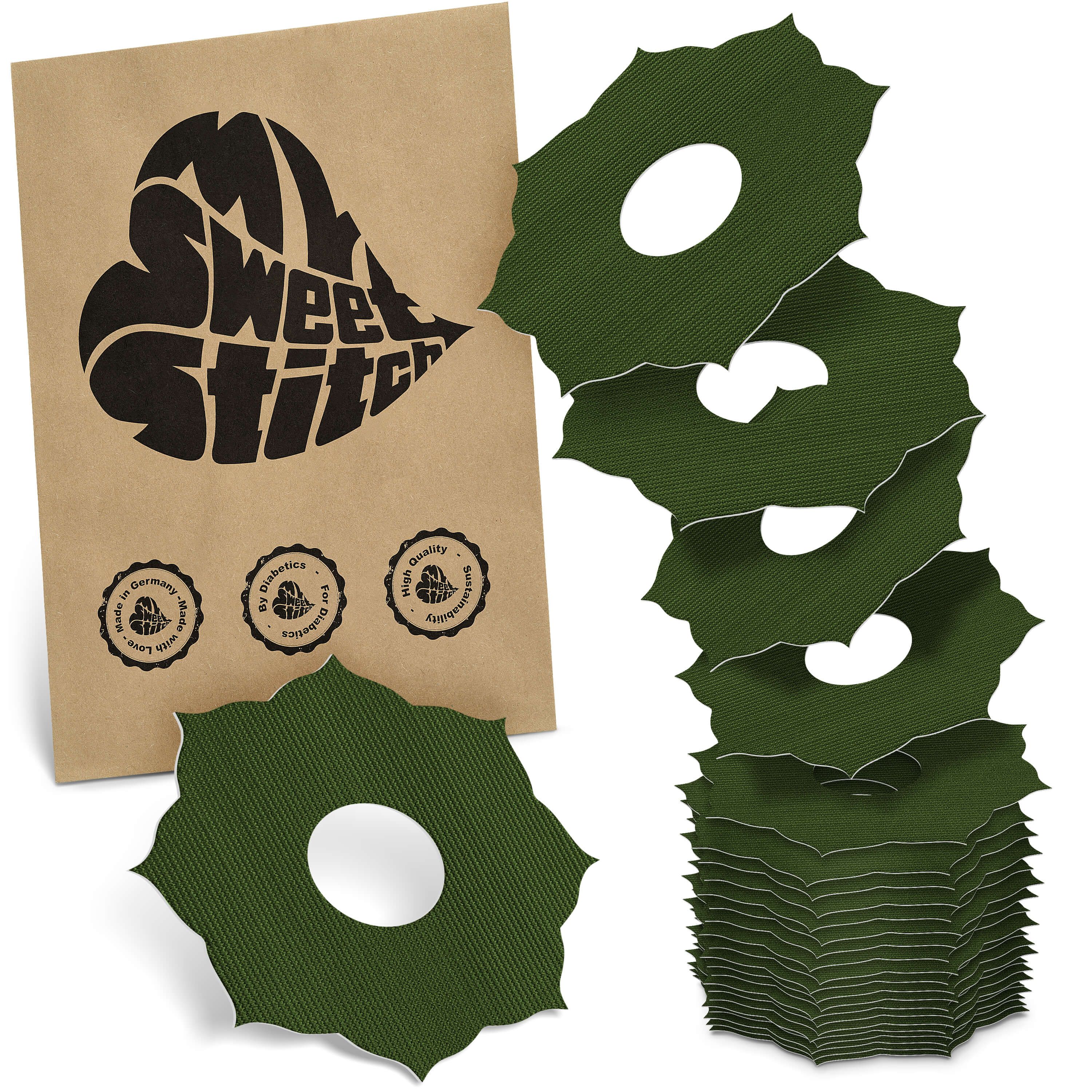 Grüne Ringpflaster mit Loch, neben brauner Verpackung mit Logo. Siegel: Made in Germany, By Diabetics, High Quality.