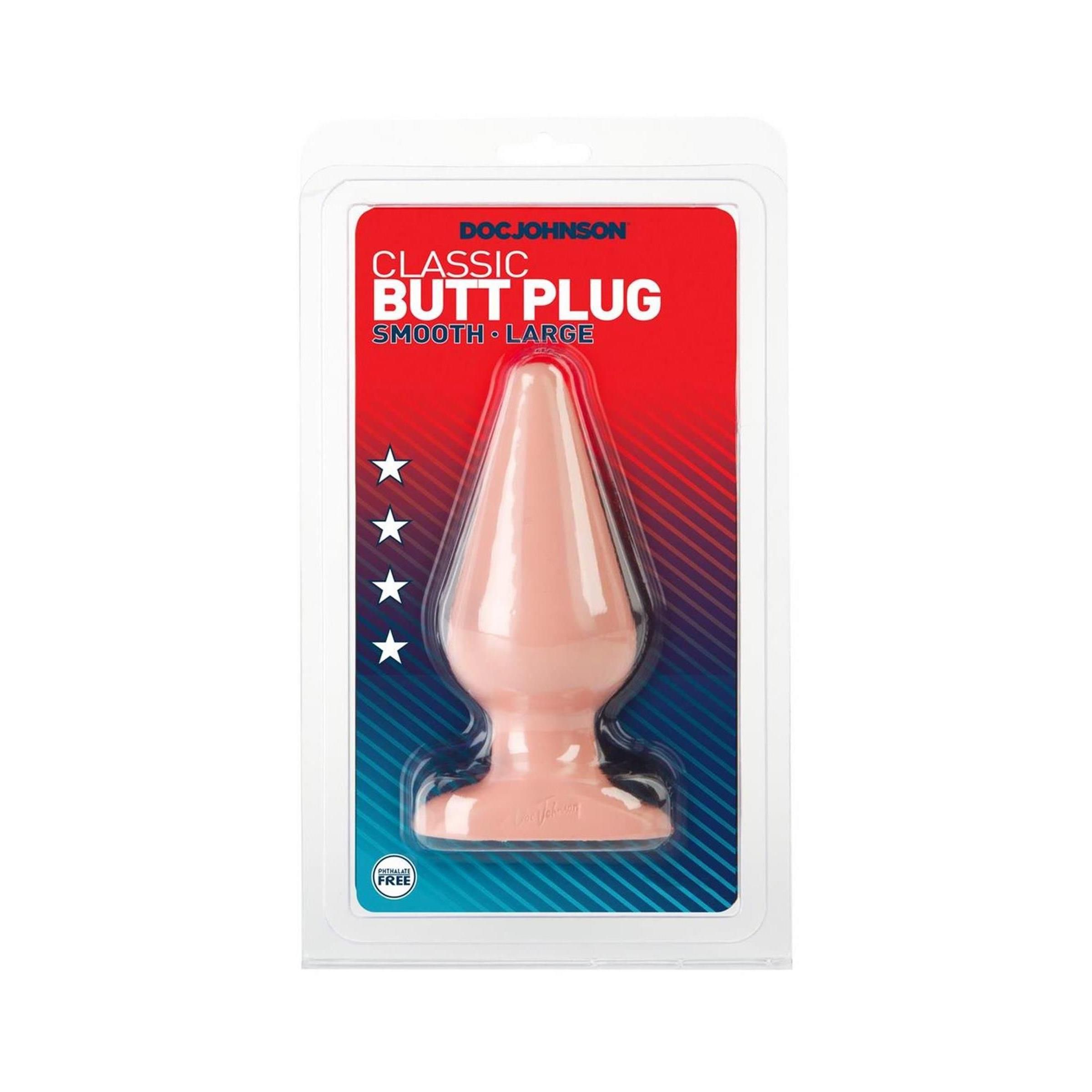 Butt Plug in Verpackung. Rosa, konisch zulaufend, mit breiter Basis. Aufschrift: "Classic Butt Plug".