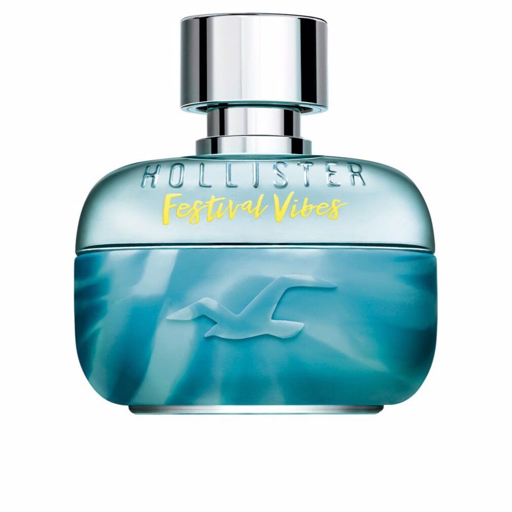 Hollister Festival Vibes Him Eau De Toilette Spray. Türkis-farbener Flakon mit silbernem Deckel. Logo und Schriftzug in Gelb.