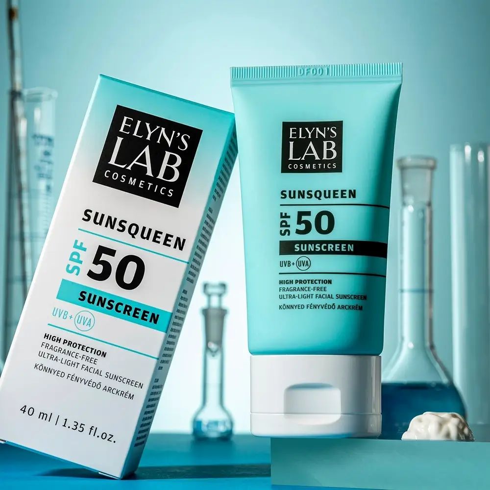 Türkisblaue Tube und Schachtel. Aufdruck: ELYN'S LAB, SUNSQUEEN SPF50, Sonnencreme. Text in Englisch und Ungarisch. 40 ml.