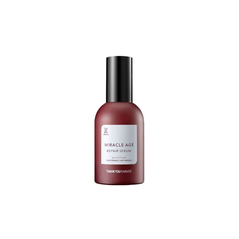 Rote Serumflasche mit schwarzem Deckel. Auf dem Etikett steht "MIRACLE AGE REPAIR SERUM" und "THANK YOU FARMER".