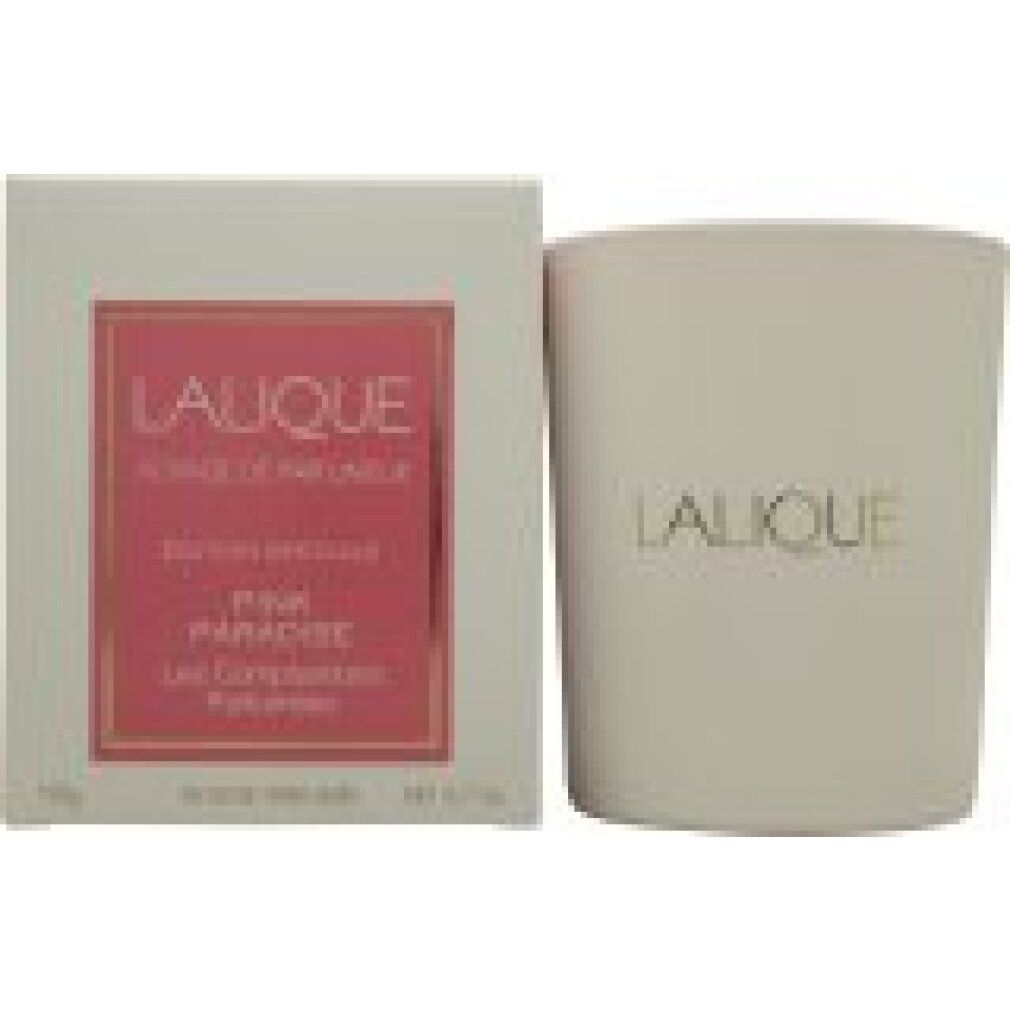 Kerze und Verpackung. Rosa Etikett mit Text: LALIQUE, Pink Paradise, Les Compositions Parfumées. Goldener Schriftzug.