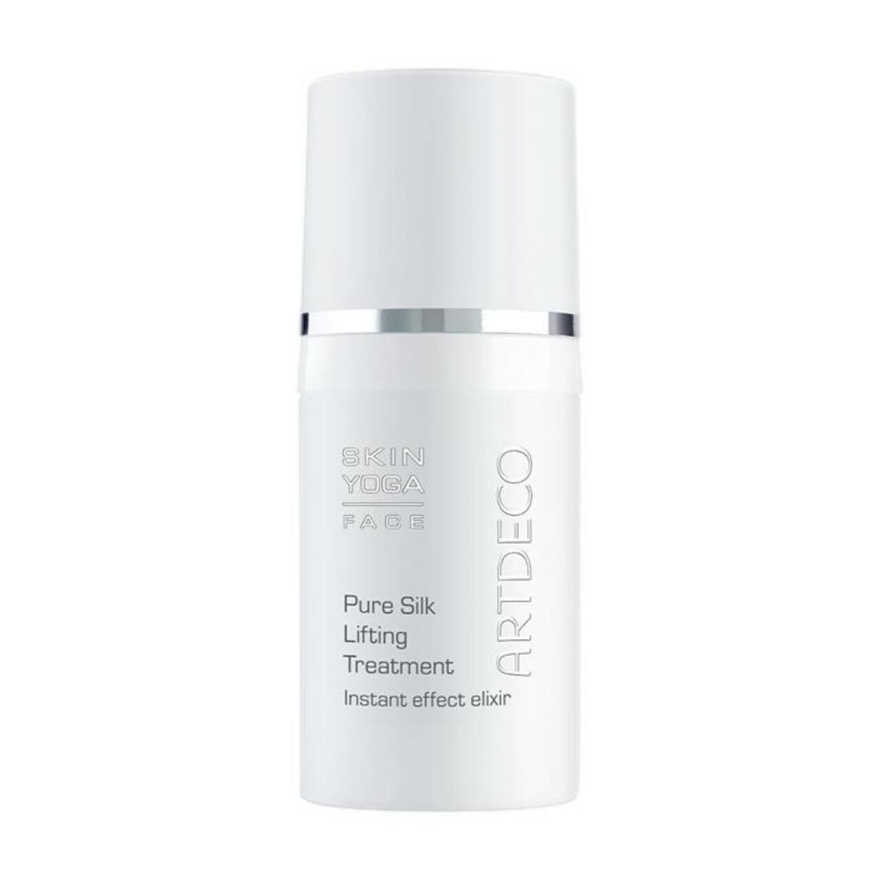Weißer Zylinder mit silbernem Deckel. Aufschrift: Skin Yoga Face, Pure Silk Lifting Treatment, Artdeco.