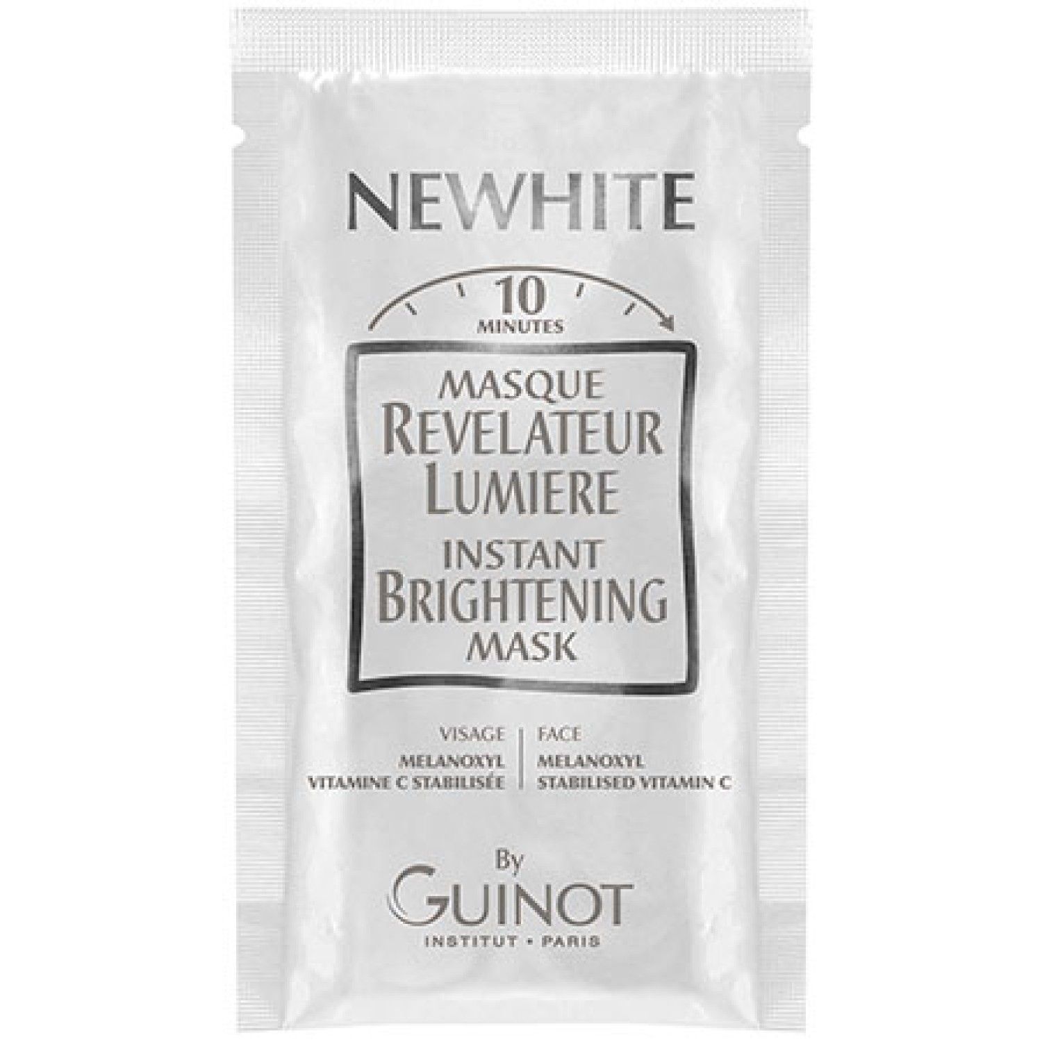Guinot Newhite Mask. Einzelpackung. Aufschrift: Newhite, Masque Révélateur Lumière, Instant Brightening Mask. Marke: Guinot.
