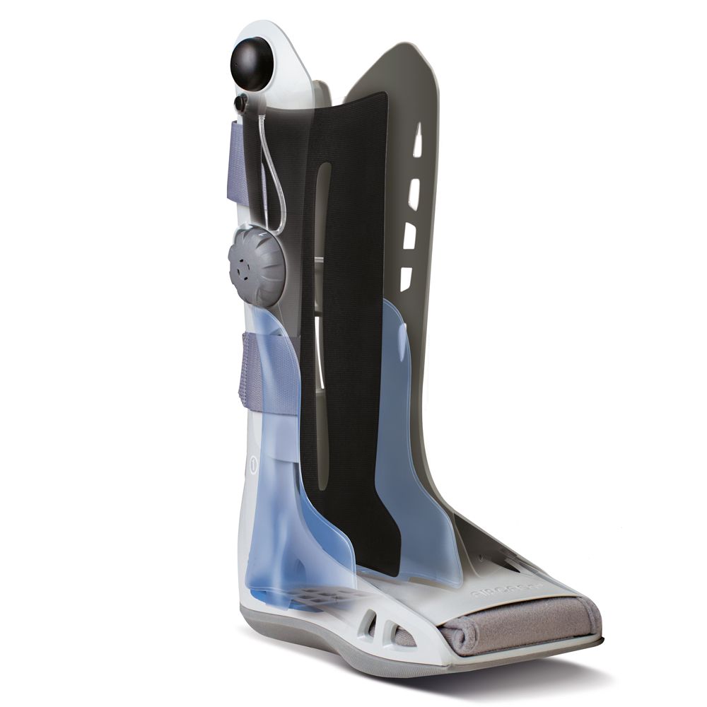 AIRCAST Airselect Elite Walker Orthese, Seitenansicht mit transparenten Elementen: Weißer Stiefel mit grauen Gurten.