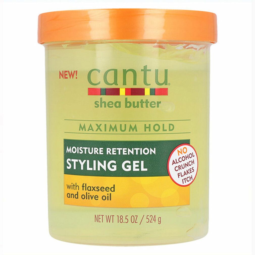 Durchsichtige Dose mit Cantu Styling Gel. Orangefarbener Deckel. Aufschrift: Maximum Hold, Moisture Retention Styling Gel, mit Leinsamen und Olivenöl.