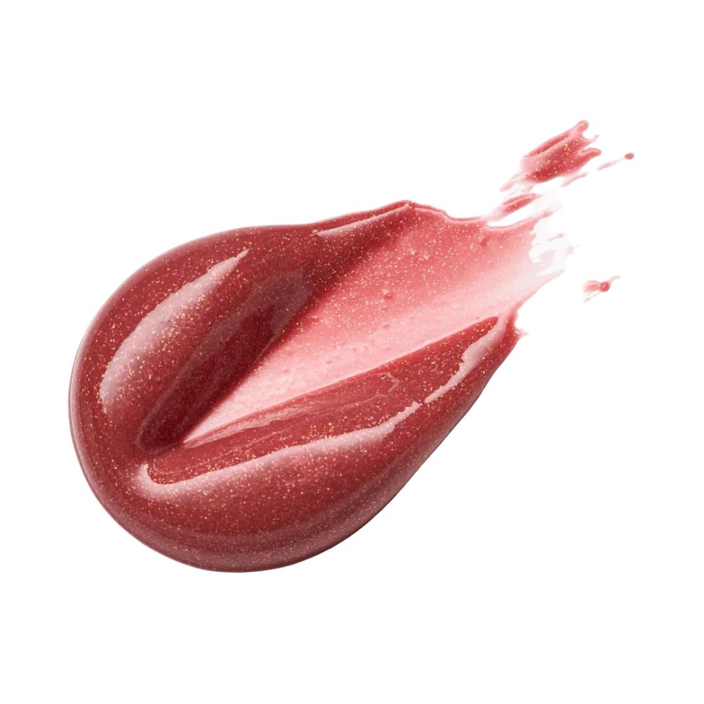 Ausgestrichenes Catrice Diamond Glaze Gloss. Rosa-goldener Farbton mit Glitzer. Glänzendes Finish.
