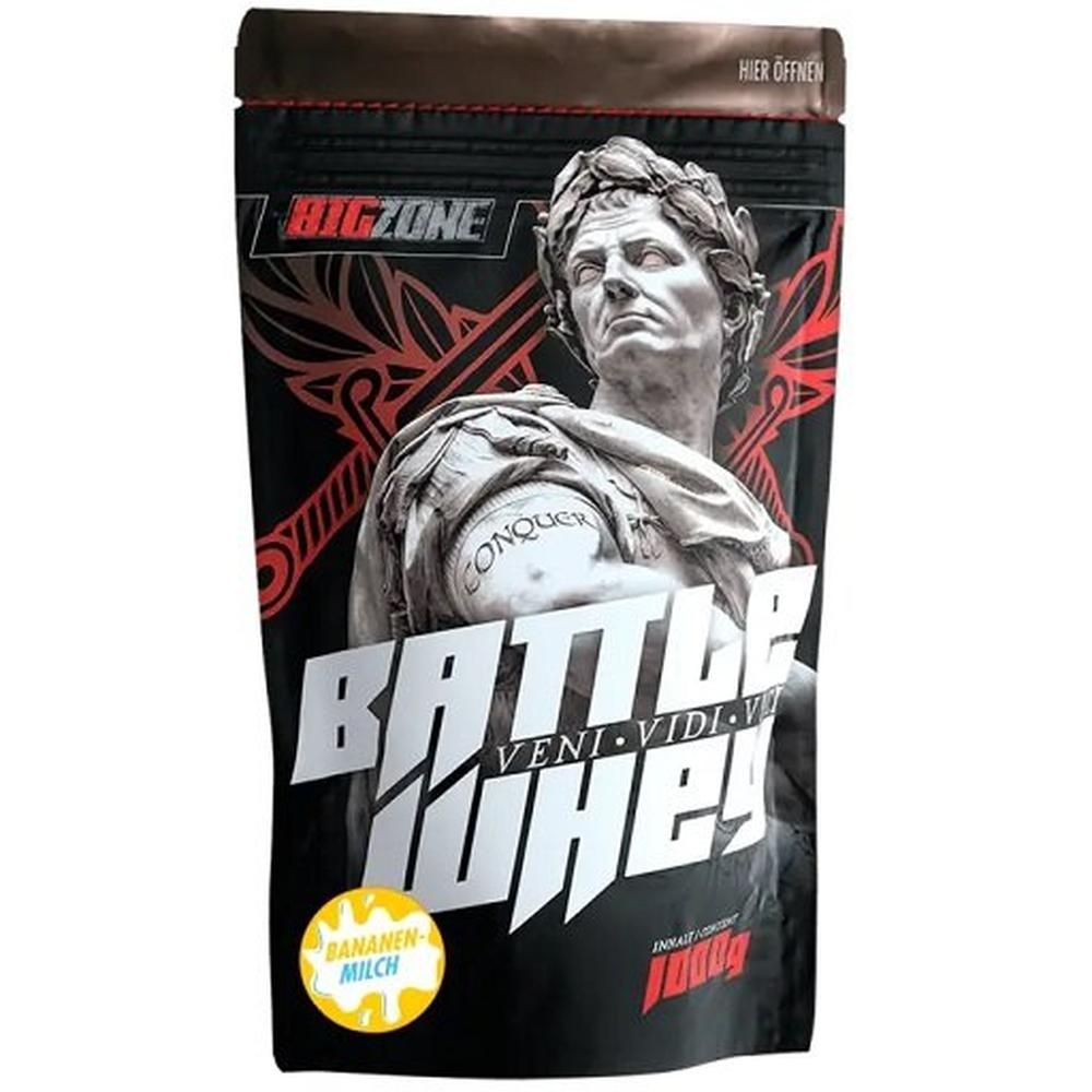 Schwarze Beutel mit "Big Zone Battle Whey"-Logo. Abbildung einer Statue. Aufschrift "Battle Whey" und "1000g".