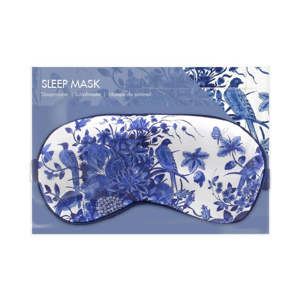 Schlafmaske in Verpackung. Blau-weißes Blumen- und Vogelmuster. Text: Sleep Mask, Schlafmaske, Masque de sommeil.