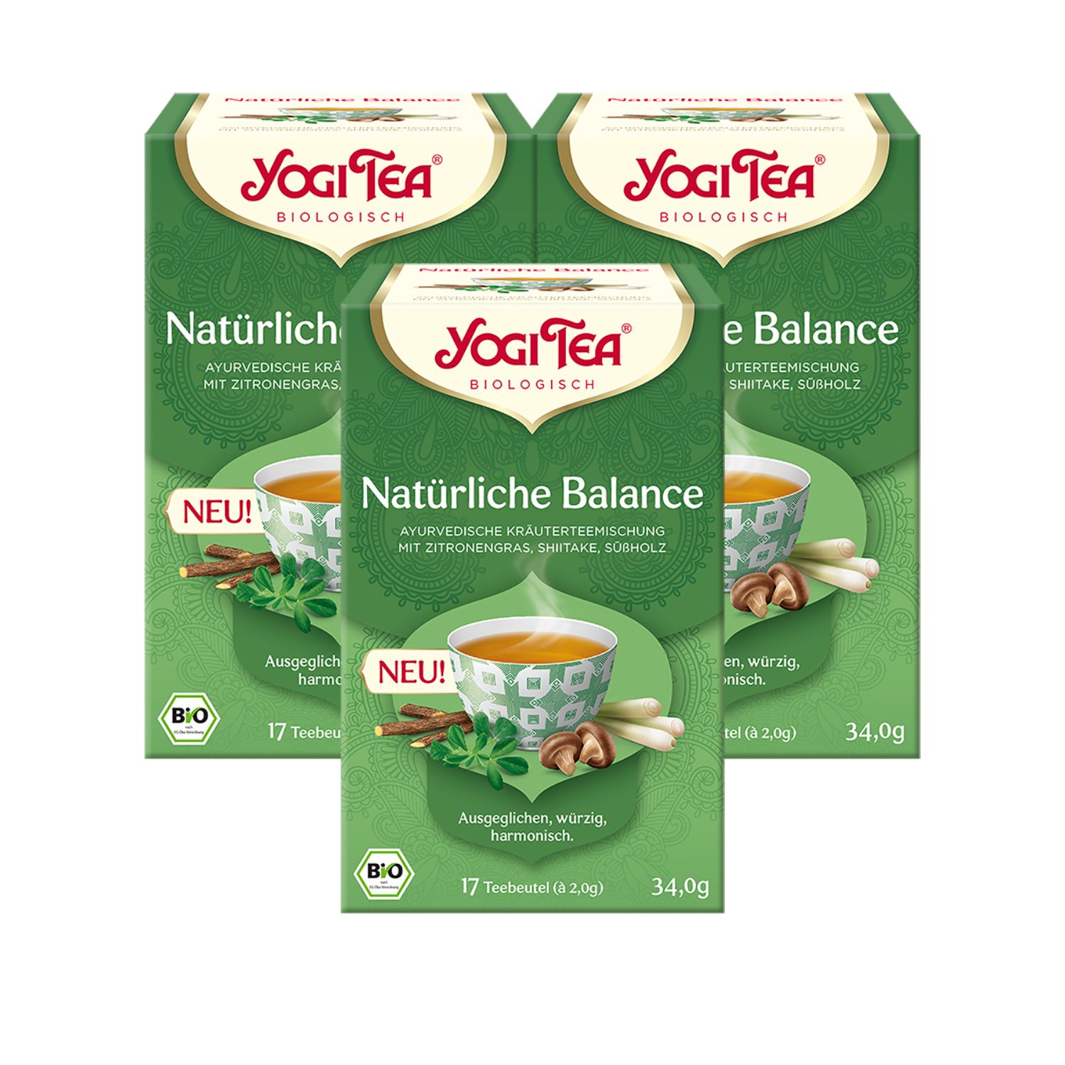 Drei grüne Yogi Tea-Verpackungen. Aufschrift: Natürliche Balance, ayurvedische Kräutermischung. Mit Bio-Siegel und 17 Teebeuteln.