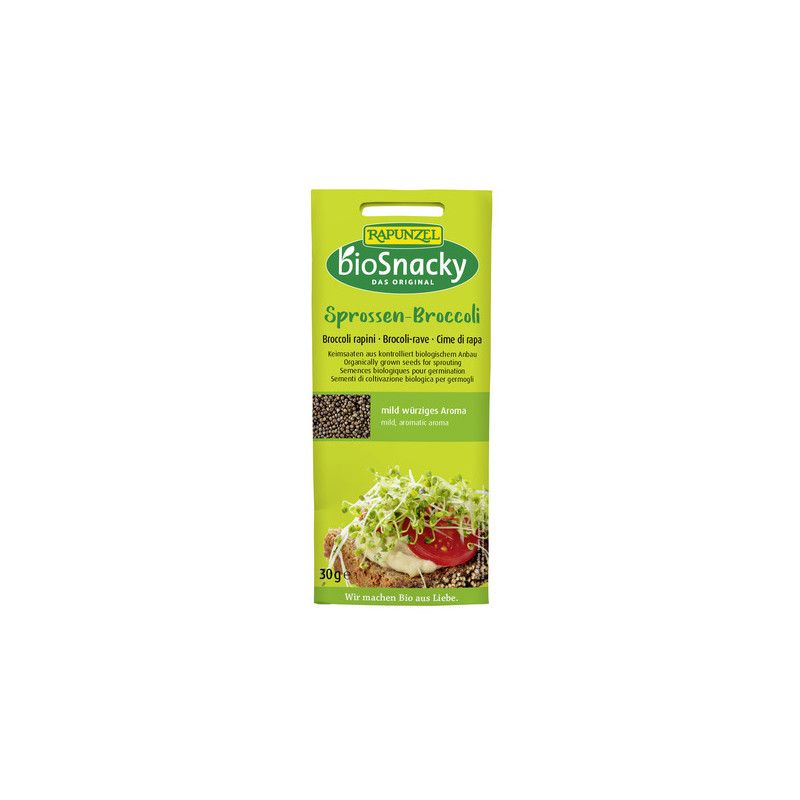 Grüne Verpackung mit "BioSnacky Sprossen-Broccoli"-Aufdruck. Abbildung von Sprossen auf Brot. Text in Deutsch, Französisch und Italienisch.