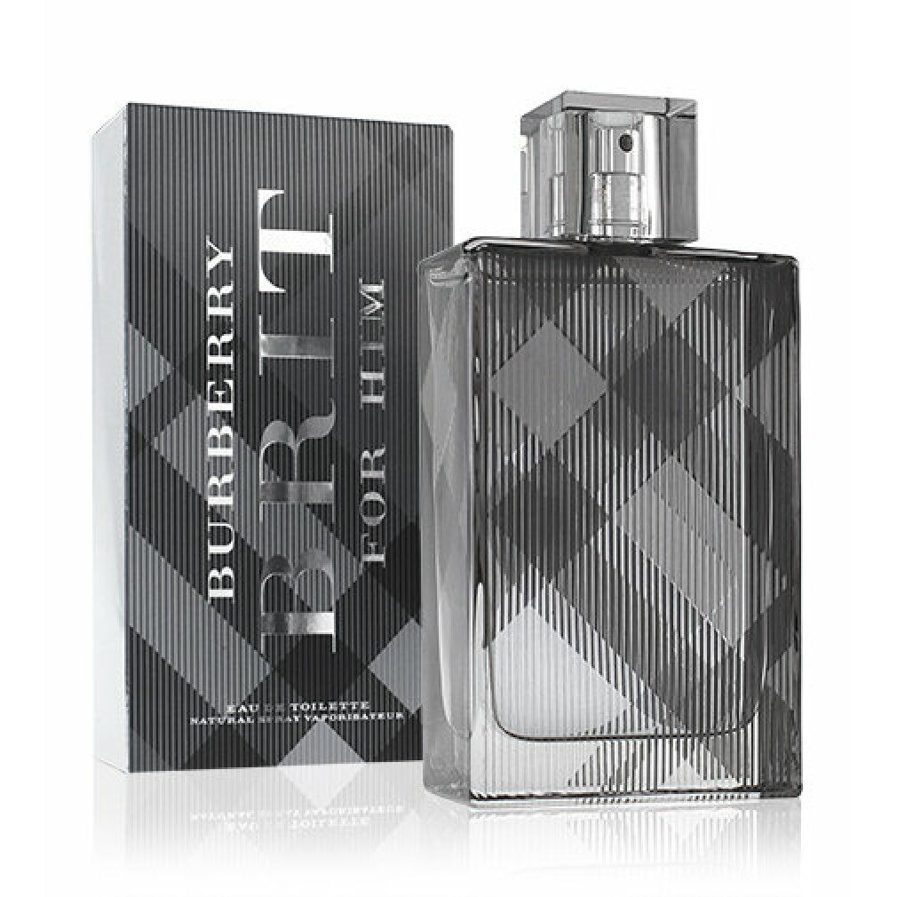 Burberry Brit For Him Eau de Toilette. Flakon und Verpackung mit Karomuster. Schriftzug auf der Verpackung.