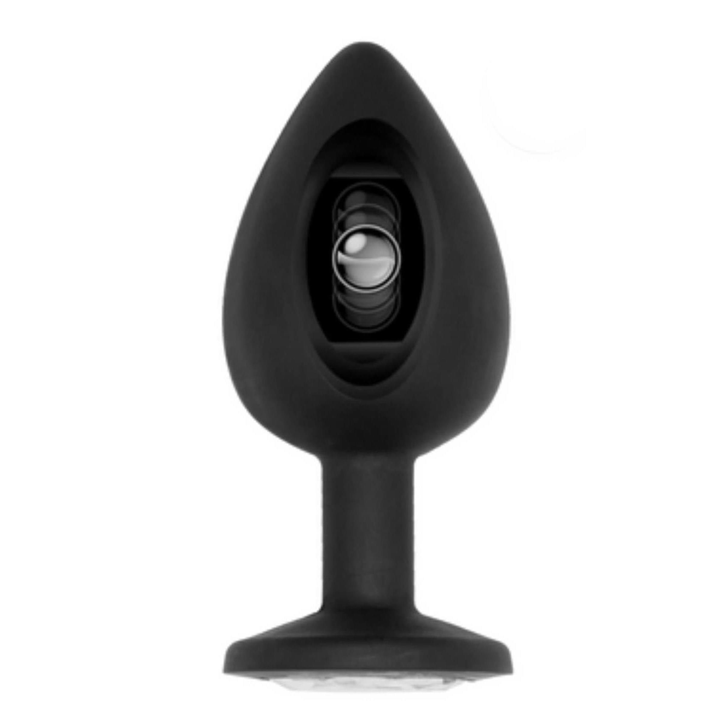 Schwarzer Butt Plug mit sichtbarem Innenleben. Interner Stimulationsstab sichtbar.