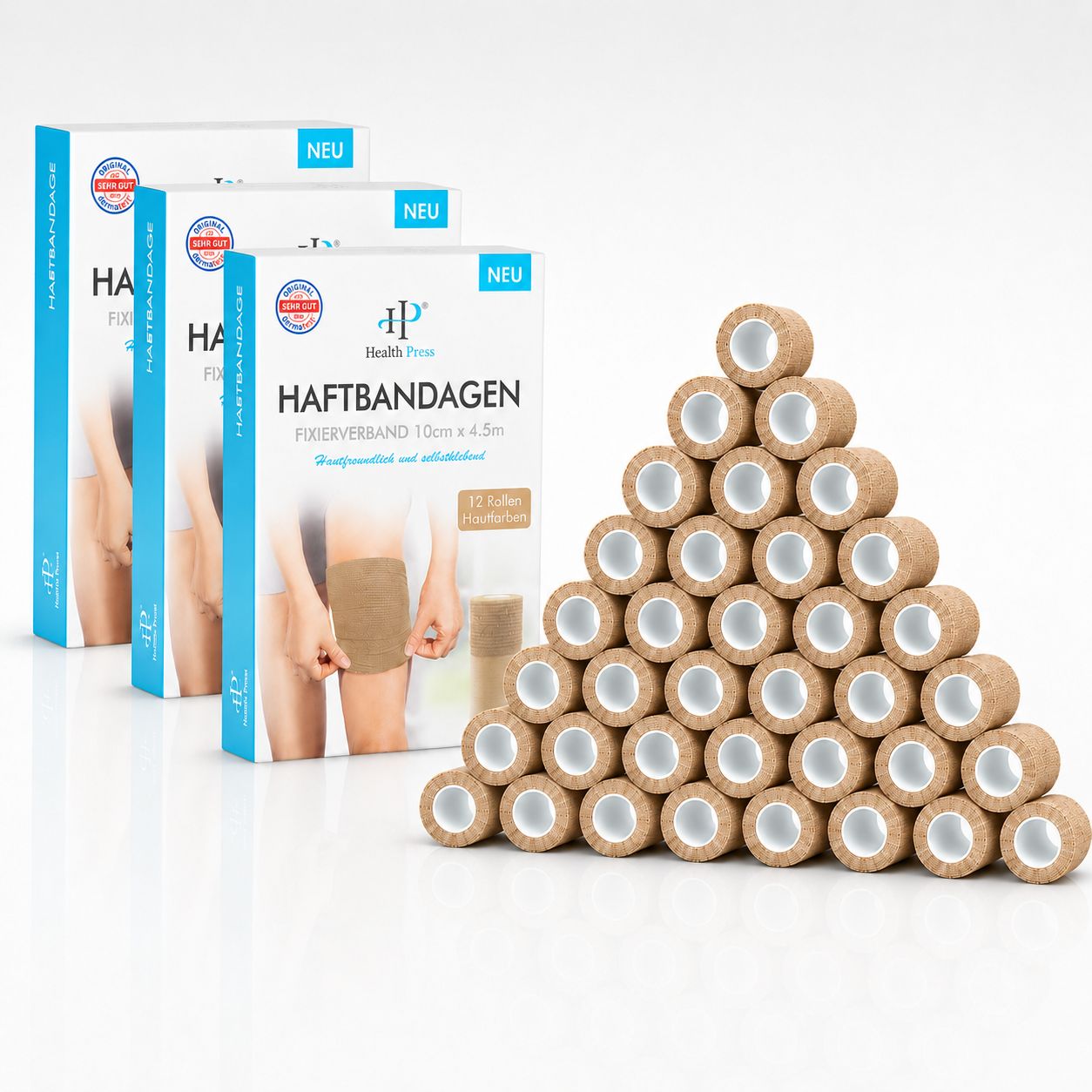 Mehrere Packungen Health Press Haftbandagen nebeneinander, rechts ein Haufen aufgerollter Bandagen.