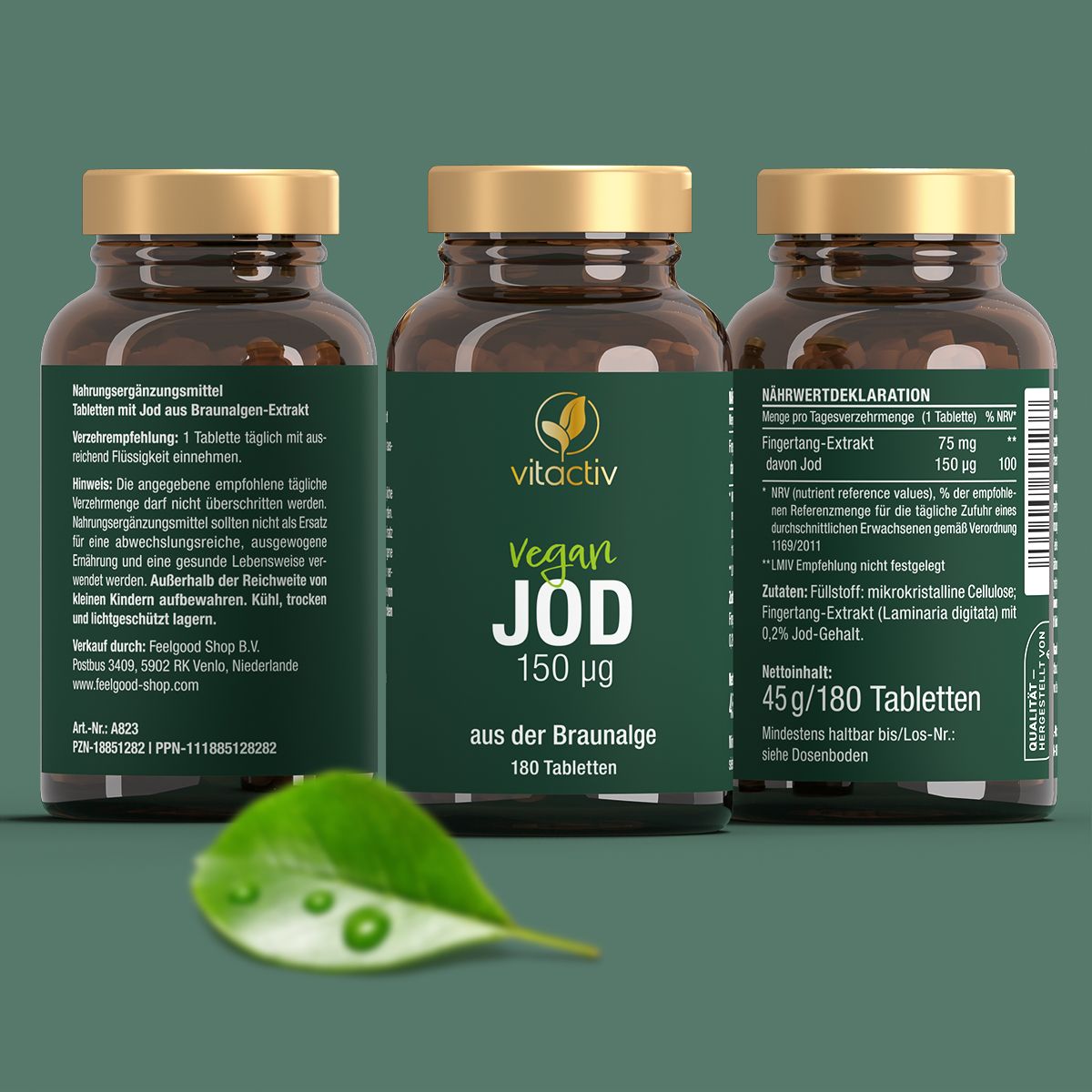 Drei Flaschen Vitactiv Vegan JOD. Aufschrift: 150 µg Jod, aus Braunalge, 180 Tabletten. Blatt mit Wassertropfen.