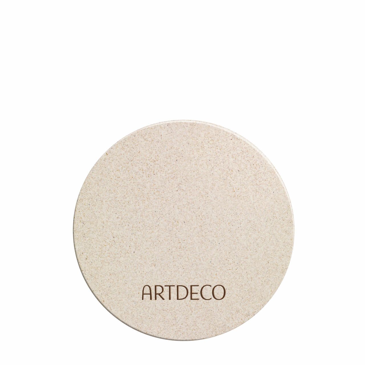 Runder Bronzer-Kompaktpuder, Deckel geschlossen. Artdeco-Schriftzug auf dem Deckel.