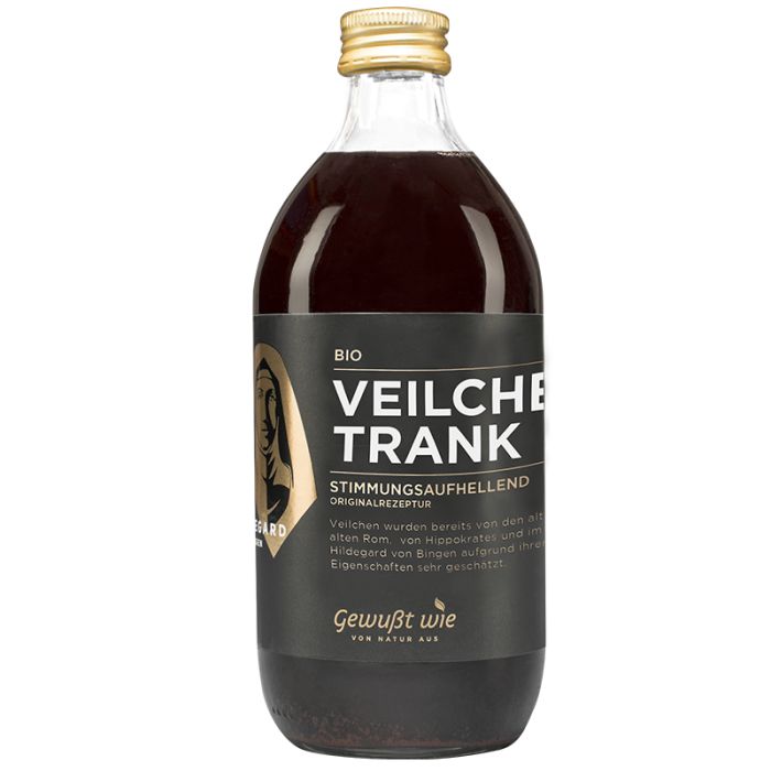 Glasflasche mit dunkler Flüssigkeit. Aufschrift: BIO Veilchen Trank. Goldfarbener Verschluss. Schwarzes Etikett mit Text und Logo.