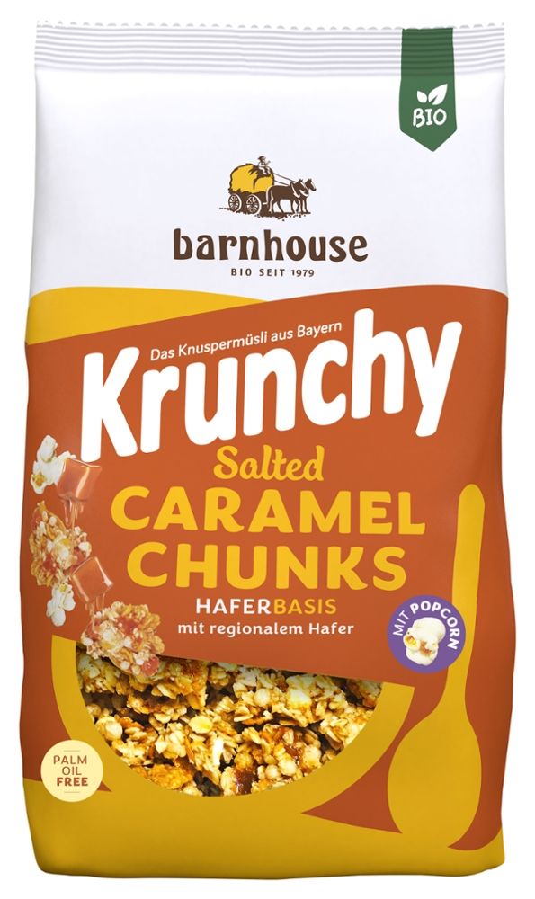 Verpackung von Barnhouse Krunchy Salted Caramel Chunks. Enthält Bio-Siegel. Text: Krunchy, Salted Caramel Chunks, Haferbasis.