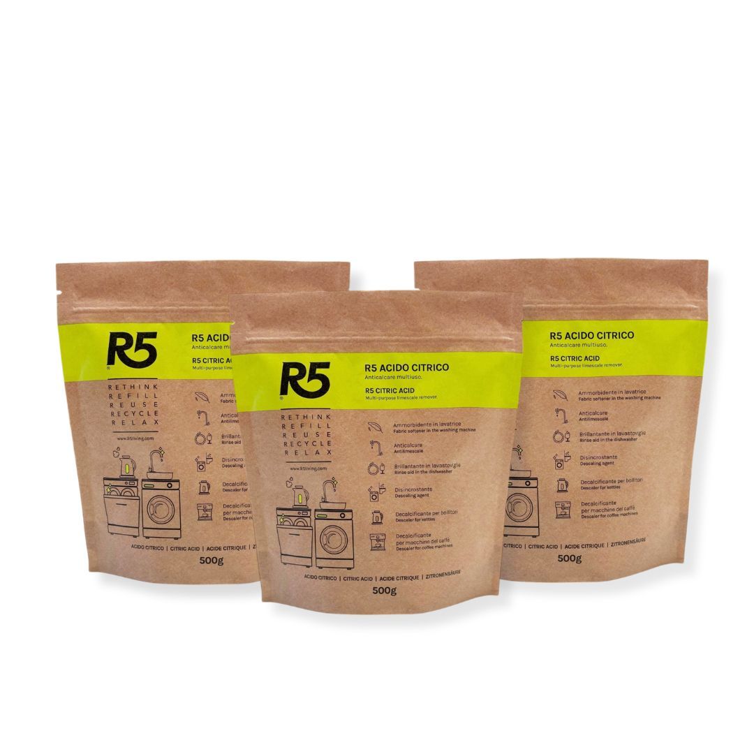 Drei Beutel R5 Acido Citrico Polvere. Verpackung mit Text und Illustrationen. Produktname und Logo deutlich sichtbar.