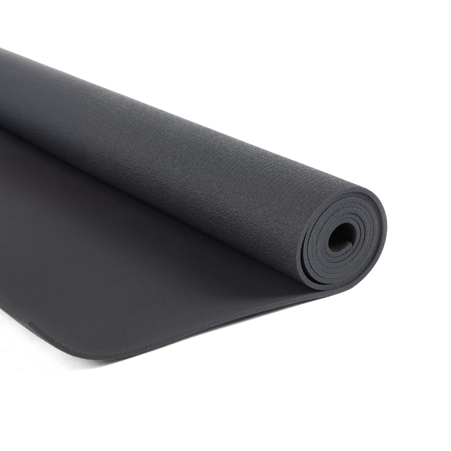 Gerollte Yogamatte, graue Farbe. Detailansicht der Oberfläche und des gerollten Endes.