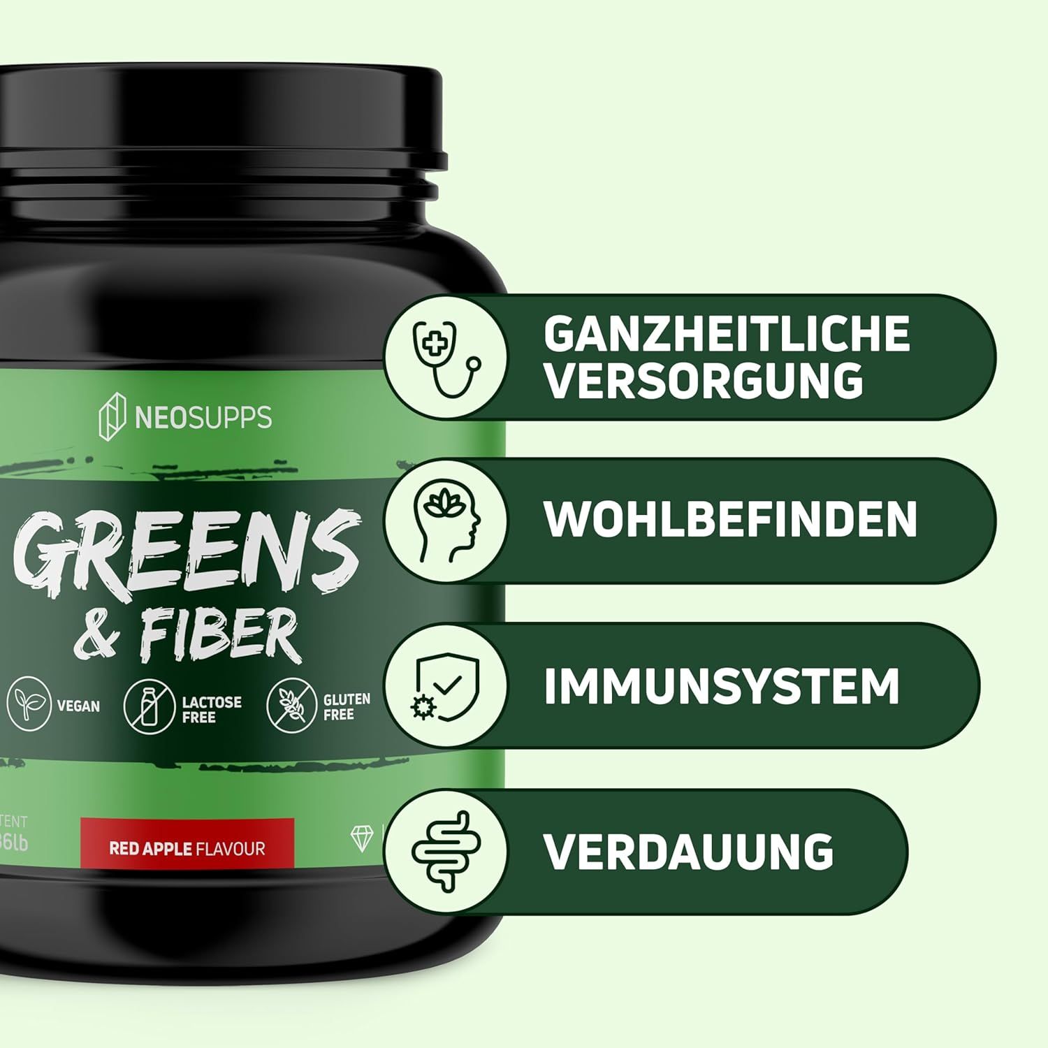 Schwarze Dose mit grünem Etikett. Aufschrift: Greens & Fiber, Red Apple Flavour. Icons für Ganzheitliche Versorgung, Wohlbefinden, Immunsystem, Verdauung.