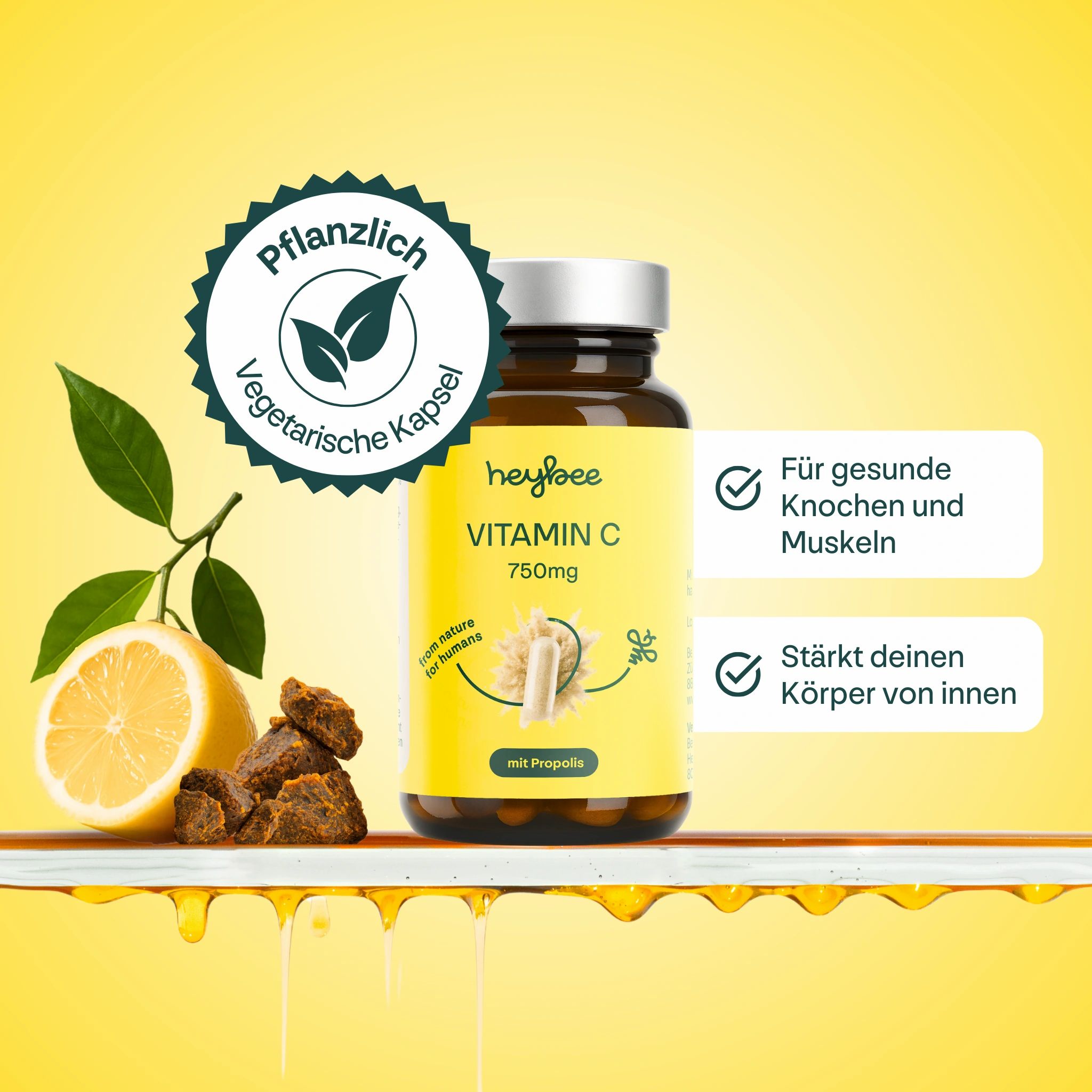 Braune Glasflasche mit gelbem Etikett. Enthält Vitamin C 750mg + Propolis. Vegetarische Kapsel. Zitrone und Propolis.