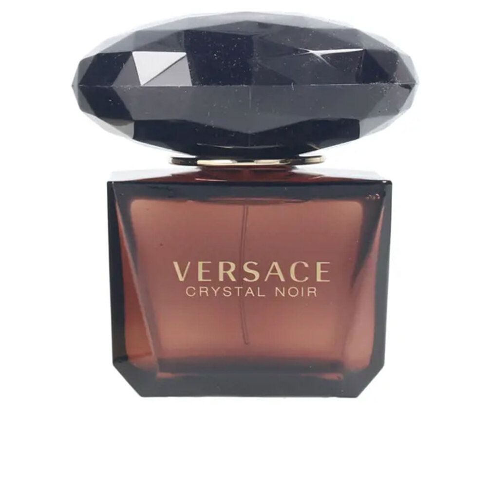 Versace Crystal Noir Flakon. Quadratischer Flakon mit facettiertem Deckel. Goldener Schriftzug 'VERSACE CRYSTAL NOIR'.