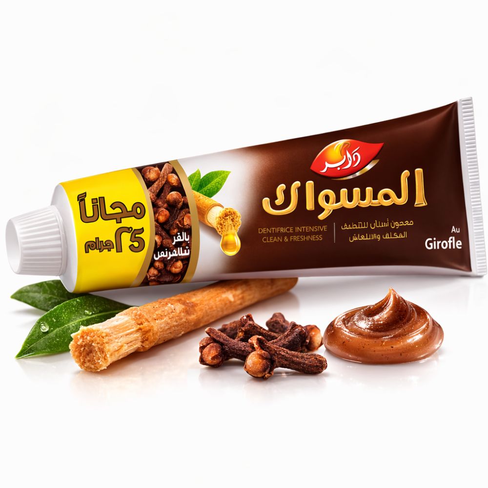Braune Zahnpasta-Tube, Miswak, Nelken und Zahnpasta-Klecks. Arabische Schriftzeichen. "Girofle"-Logo.