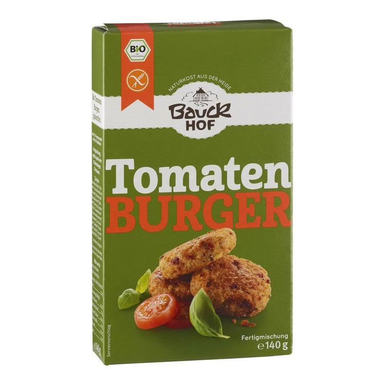 Grüne Verpackung mit "Bauckhof Tomaten Burger" Schriftzug. Bio-Siegel und glutenfrei-Symbol. Abbildung von Burgern, Tomate und Basilikum.
