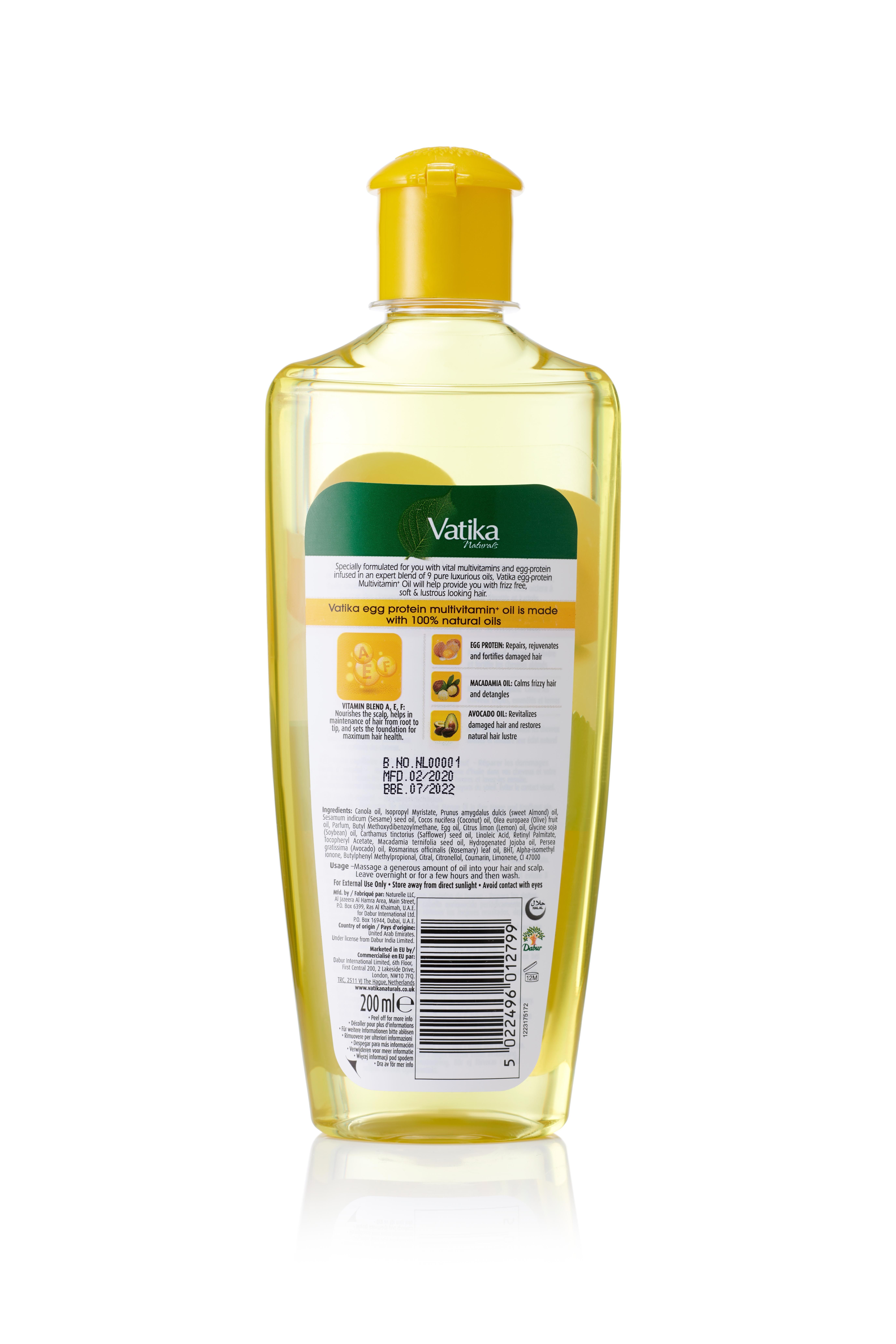 Rückseite der Vatika Naturals Haaröl-Flasche. Gelbe Flasche mit gelbem Deckel. Etikett mit Produktinformationen und Inhaltsstoffen.