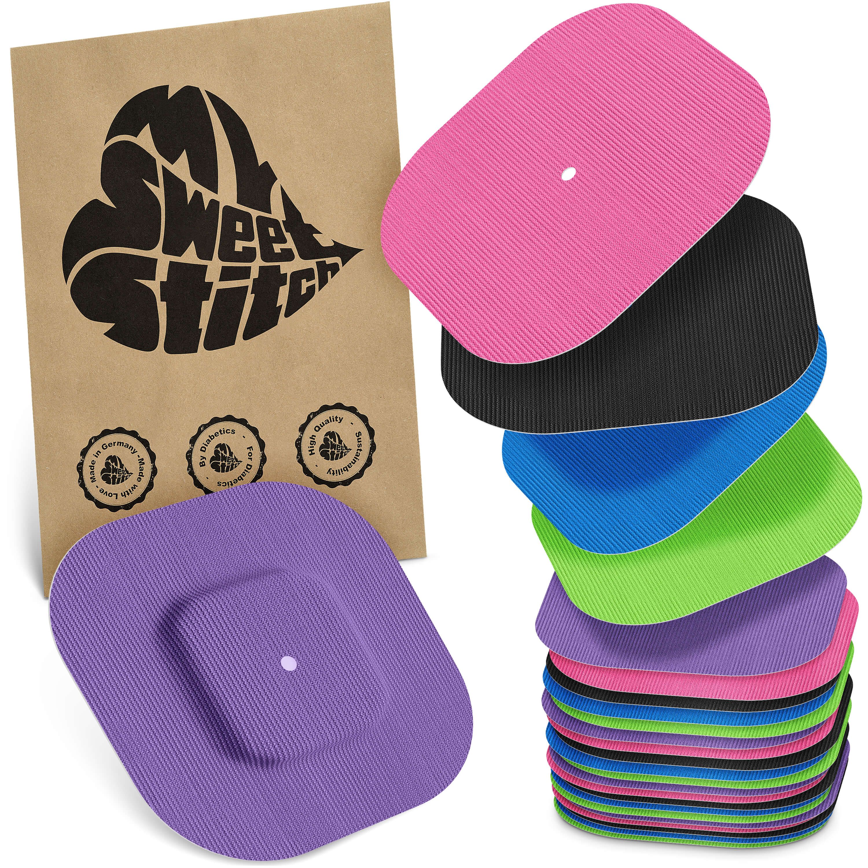 Verschiedenfarbige, rechteckige Pflaster mit abgerundeten Ecken. Ein brauner Beutel mit Logo und Qualitätssiegeln.