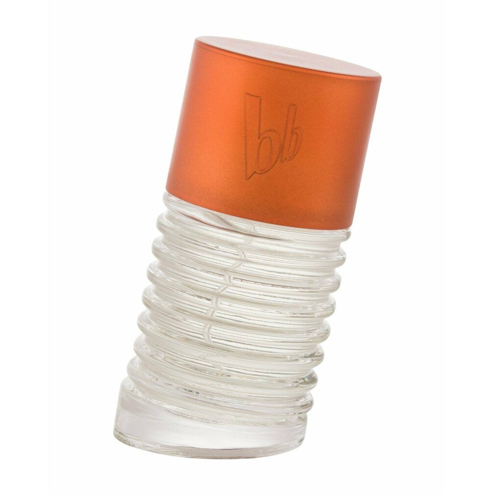 Parfümflakon aus Glas mit orangefarbenem Deckel. Der Flakon hat eine geriffelte Form.