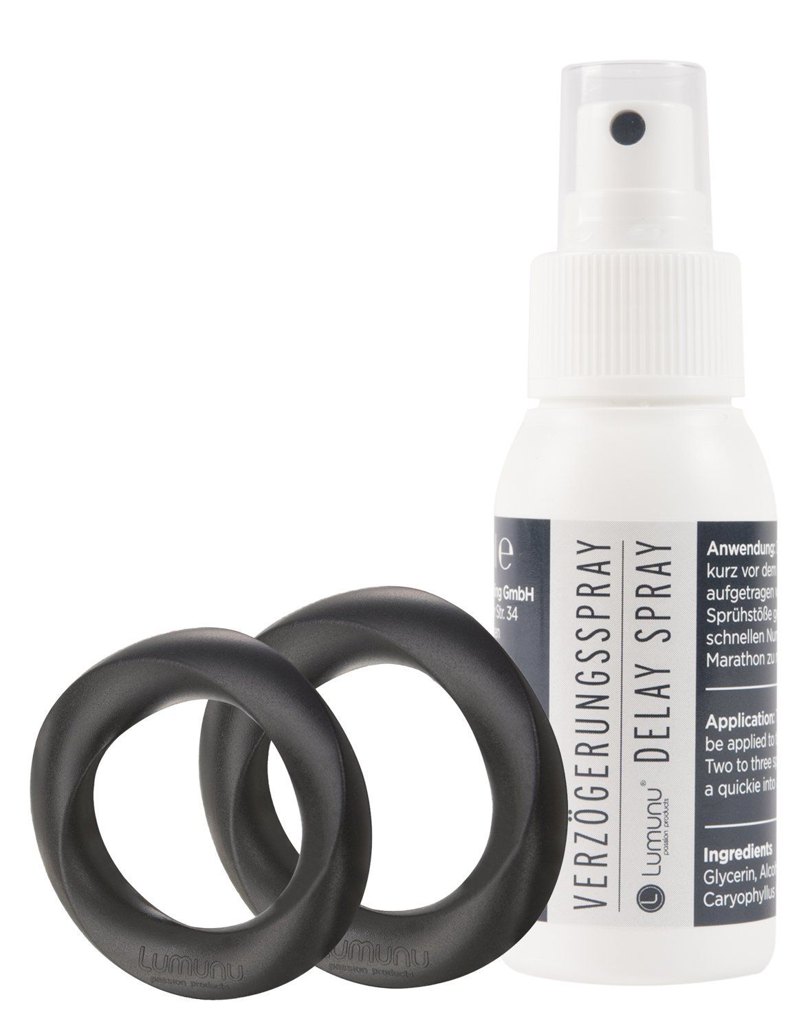 Zwei schwarze Penisringe und eine weiße Sprühflasche mit der Aufschrift "Verzögerungsspray Delay Spray".