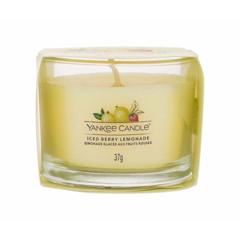 Kerzenglas mit Aufdruck. Aufschrift: Yankee Candle, Iced Berry Lemonade, 37g. Gelbes Wachs, Docht. Klare Glasverpackung.